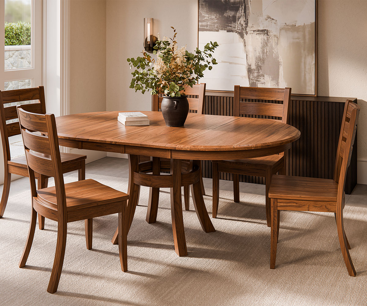Oval wood dining table with six ladder-back chairs on rug, warm modern dining room furniture.