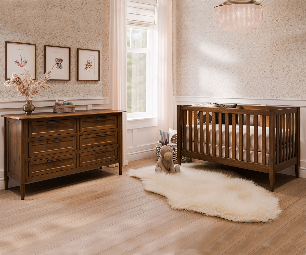 Children's furniture walnut crib and dresser in cozy neutral nursery