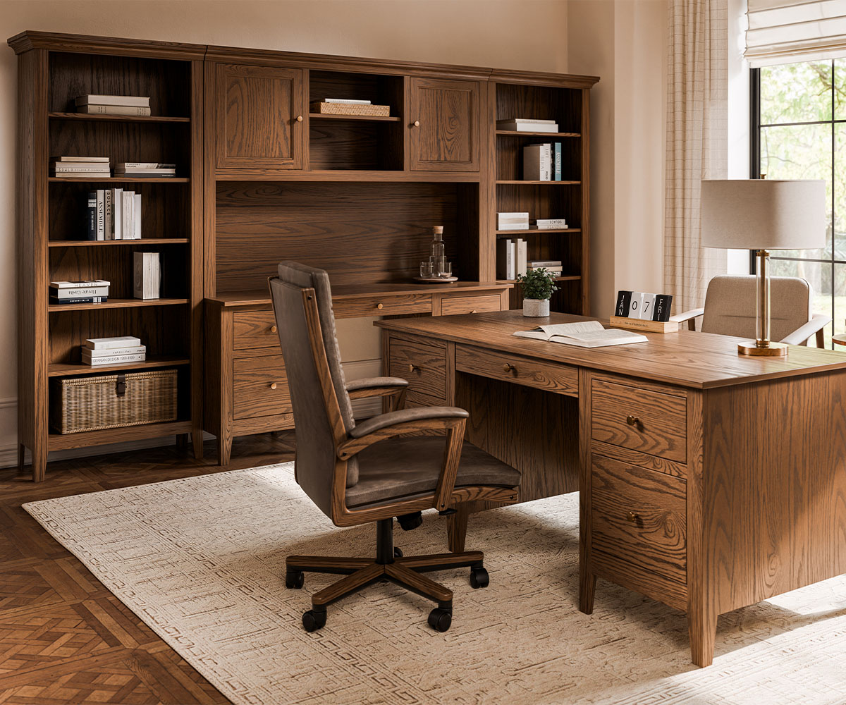 Modern home office with a solid wooden desk and hutch, featuring built-in shelves and cabinets